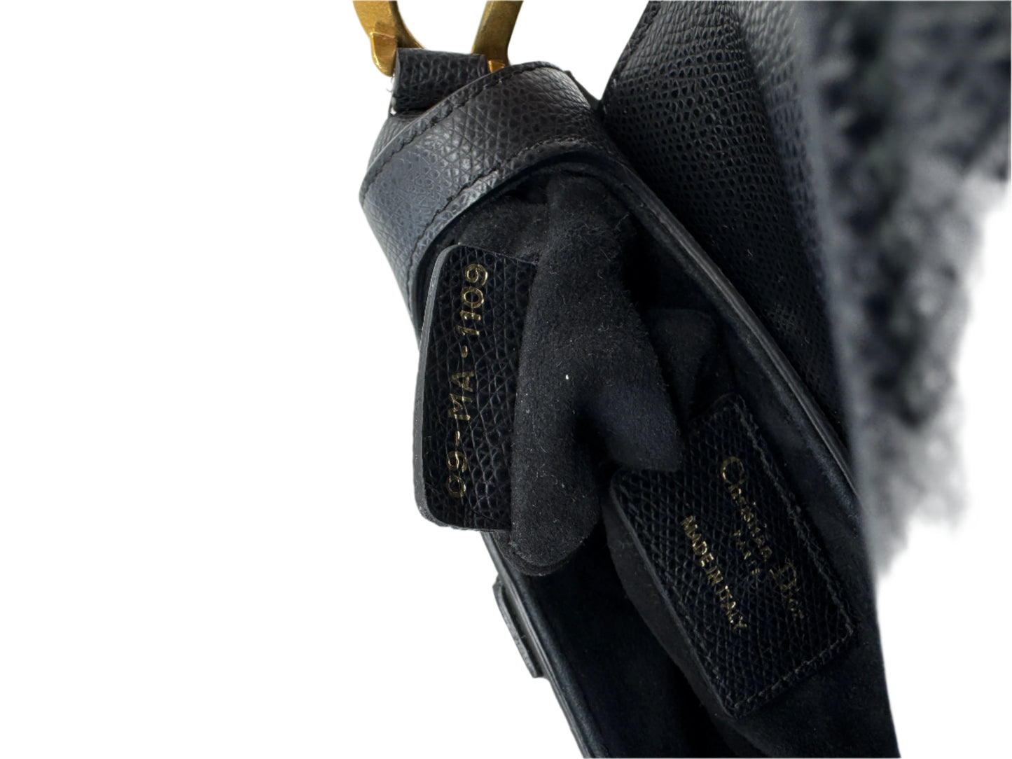 Authenticity-label-of-the-Dior-Saddle-Bag-Black-Mini-with-Dior-brand-country-of-origin-Italy-and-unique-serial-number