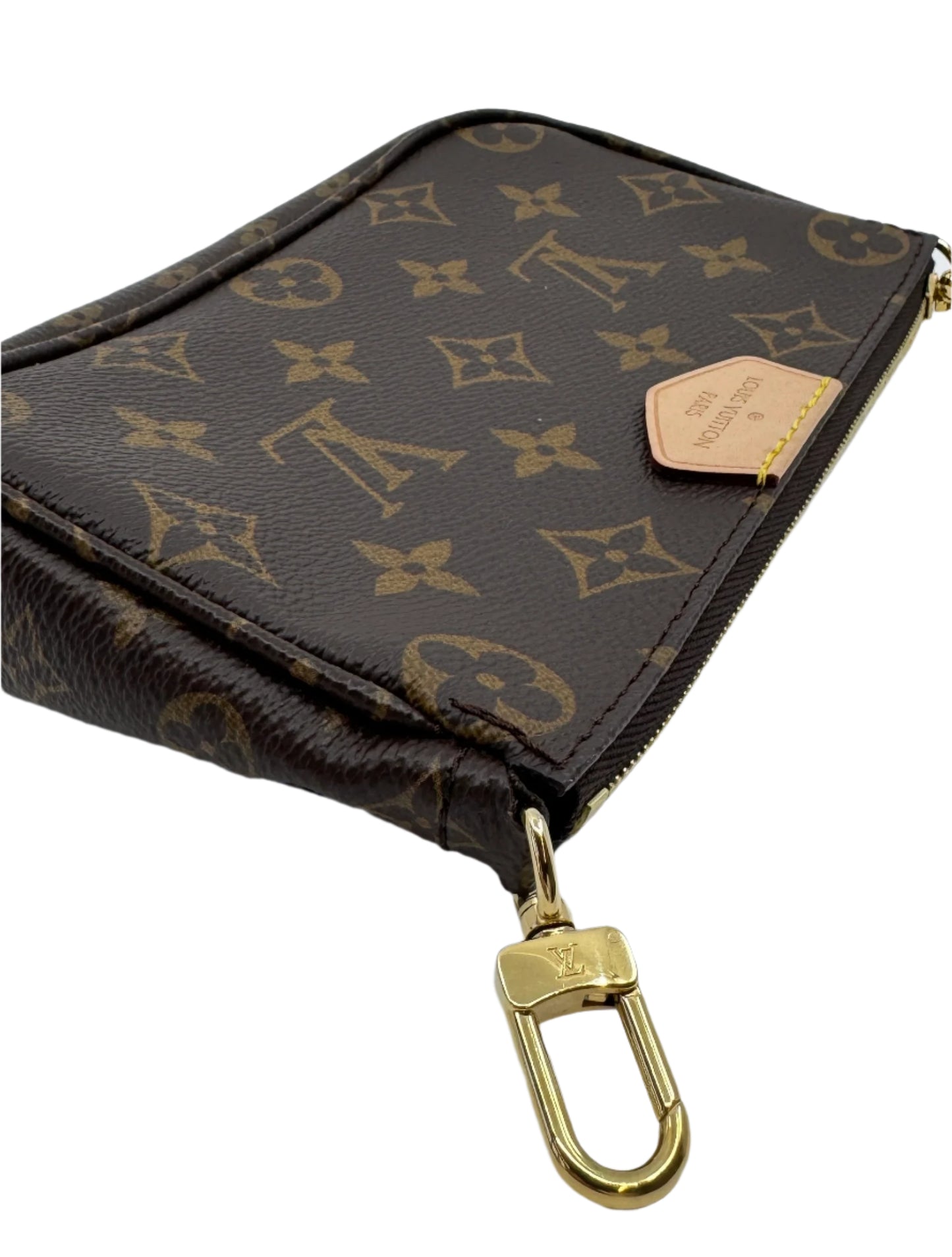 Detail-of-the-golden-hardware-attachment-of-the-Louis-Vuitton-Multi-Pochette-Accessoires-where-the-removable-strap-is-attached-with-LV-engraved