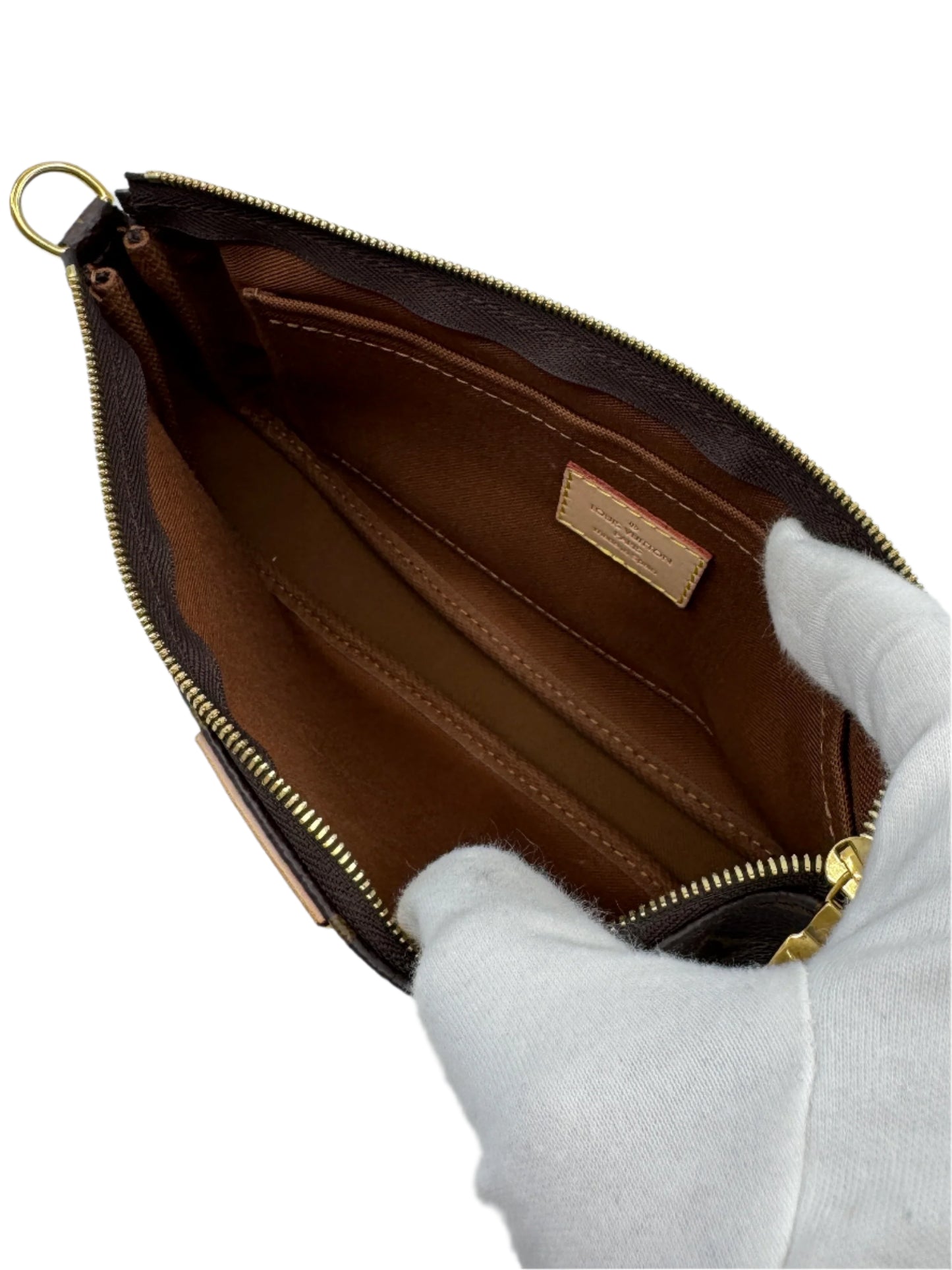 Interior-of-the-pochette-of-the-Louis-Vuitton-Multi-Pochette-Accessoires-in-brown-with-brand-label-inside