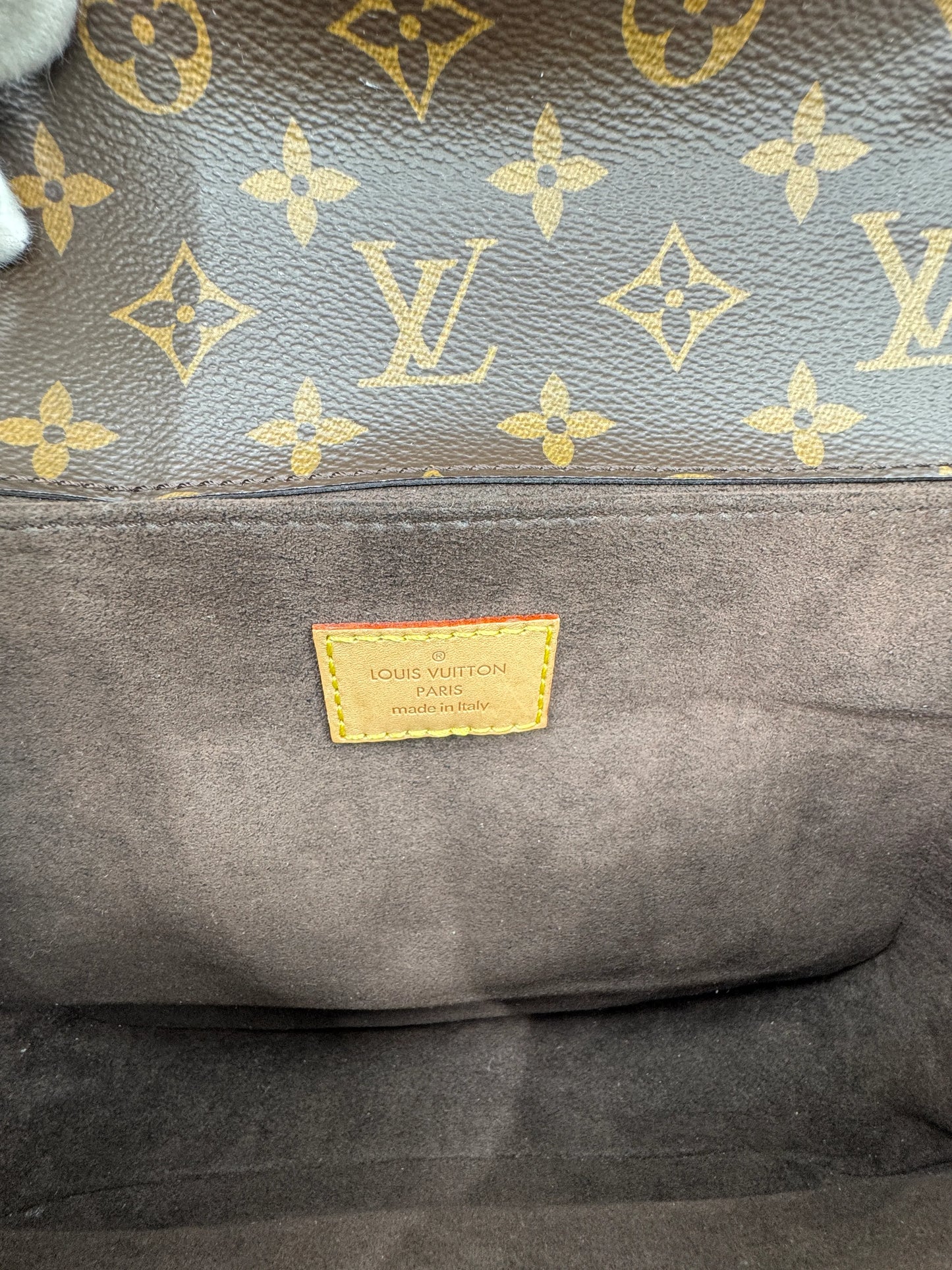 Louis-Vuitton-Metis-Pochette-Monogram-tag-showing-authenticity-and-country-of-manufacture