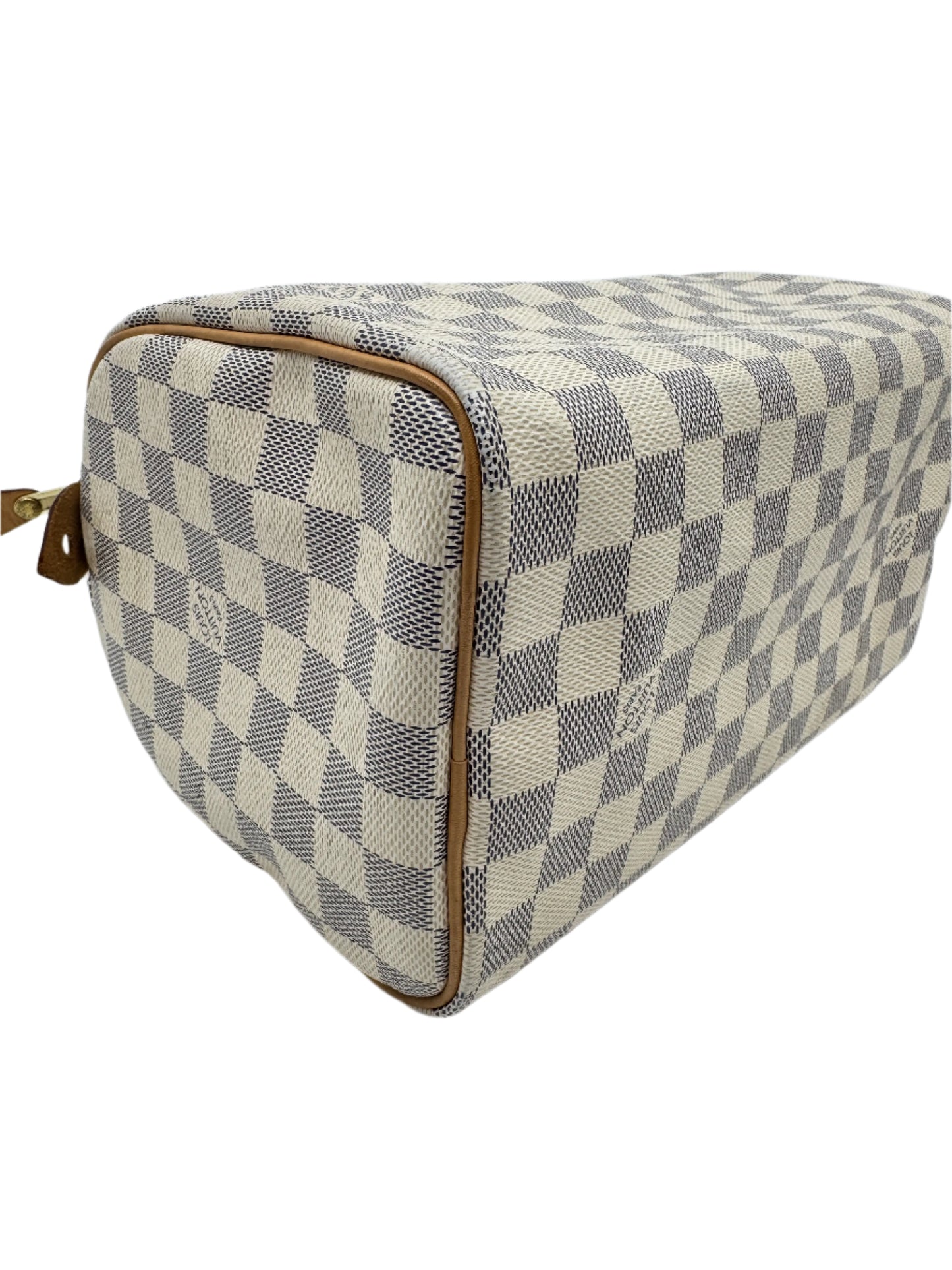 Louis-Vuitton-Speedy-25-Damier-Azur-lying-down-with-details-of-the-coated-leather-on-the-side-panels.