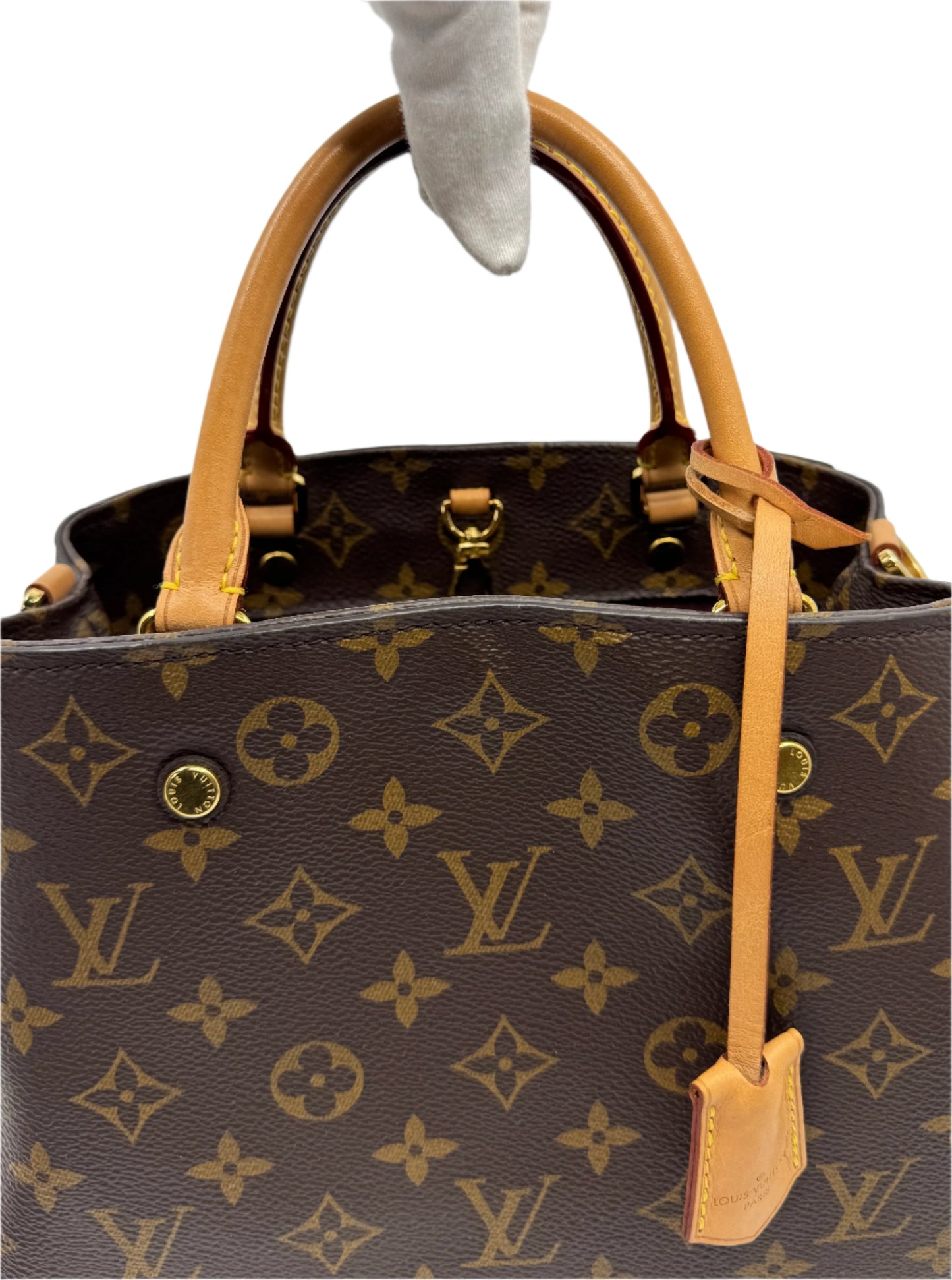 front-part-of-louis-vuitton-montaigne-bb-bag-in-monogram-with-vachetta-leather-details-on-strap
