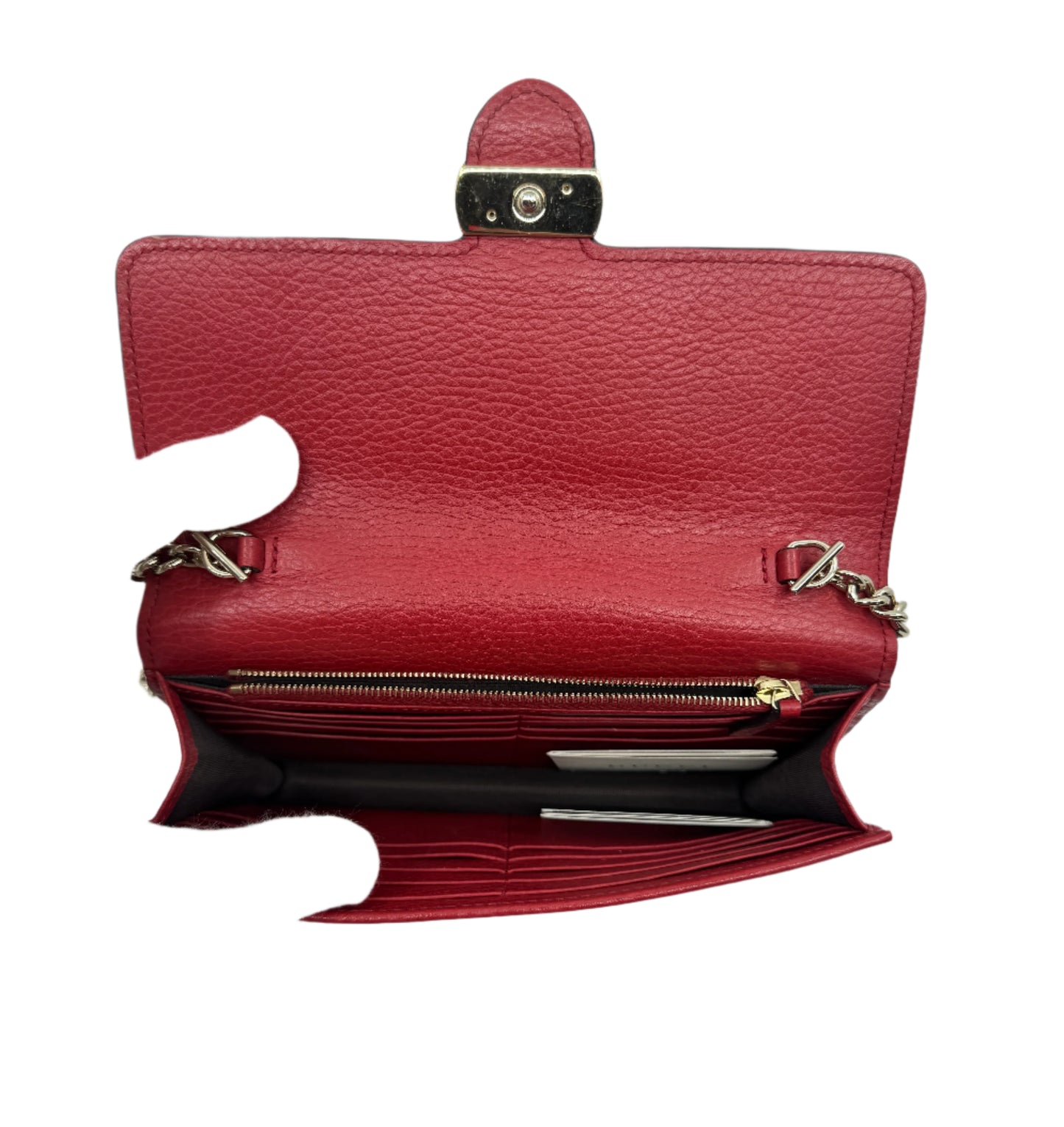 interior-of-the-gucci-dollar-calfskin-interlocking-g-chain-wallet-in-red-with-gold-magnetic-closure-gold-zippered-pocket-and-organizational-compartments