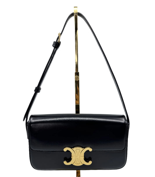 Front-part-of-Celine-Classique-Triomphe-Bag-in-black-with-golden-details-on-the-logo