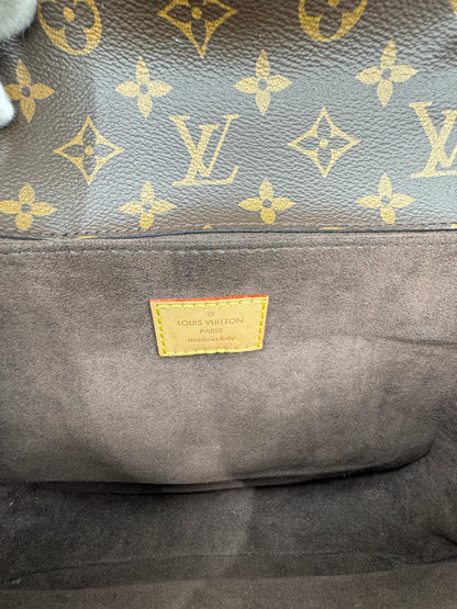 Louis-Vuitton-Metis-Pochette-Monogram-tag-showing-authenticity-and-country-of-manufacture