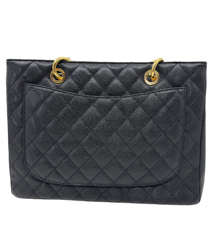 back-part-of-chanel-black-caviar-grand-shopping-tote-in-leather-with-small-external-pocket