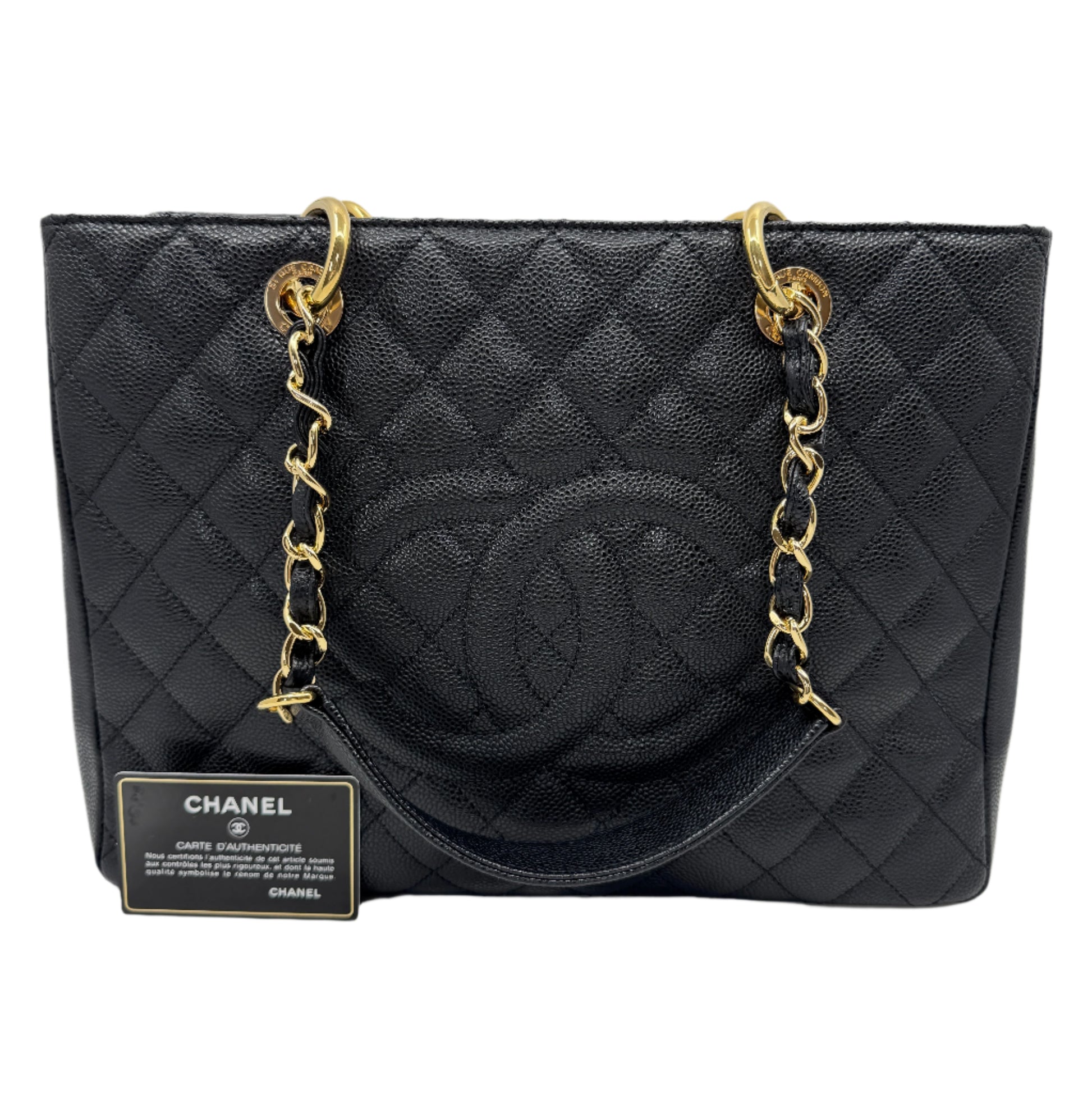 front-part-of-chanel-black-caviar-grand-shopping-tote-in-leather-with-embossed-logo-and-golden-chain-strap-with-authenticity-card