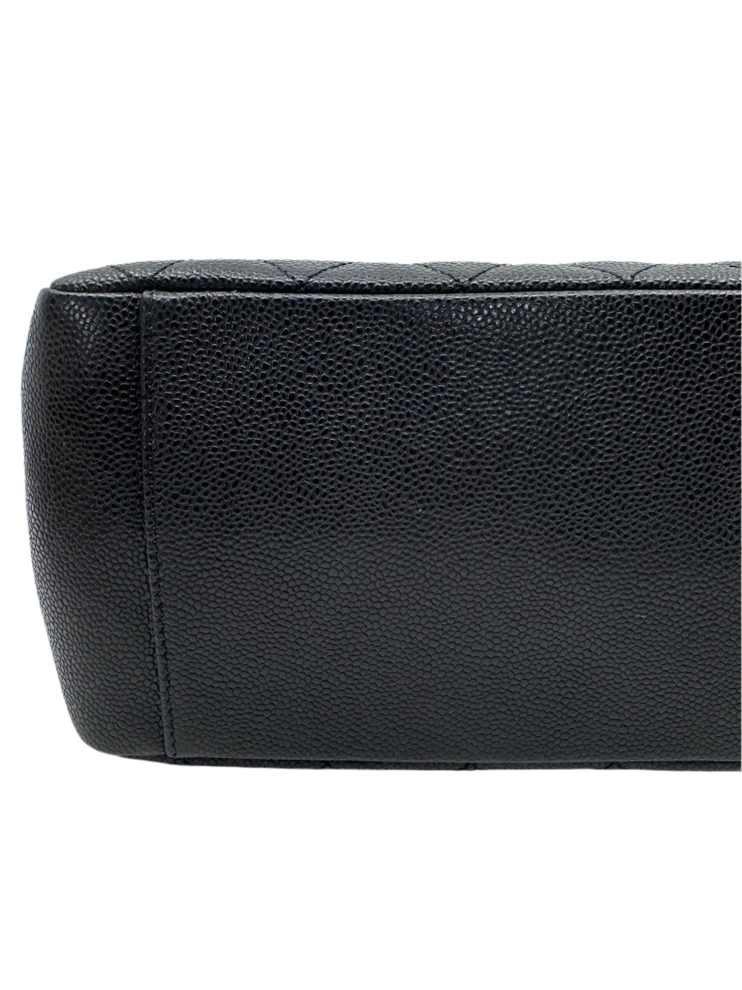 leather-finishing-on-bottom-part-of-chanel-black-caviar-grand-shopping-tote