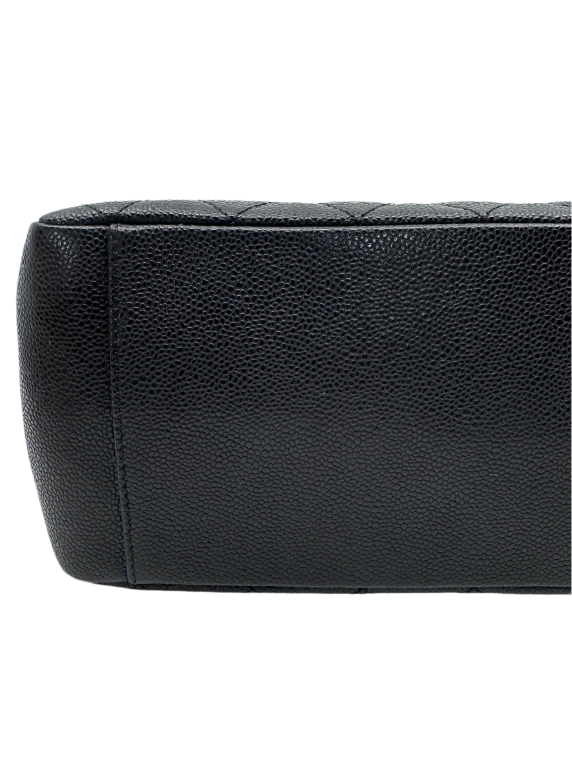 leather-finishing-on-bottom-part-of-chanel-black-caviar-grand-shopping-tote