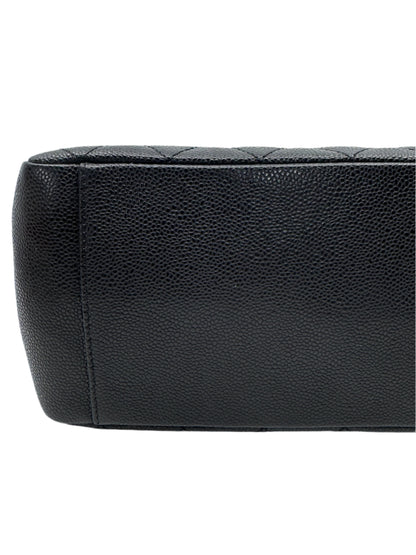 leather-finishing-on-bottom-part-of-chanel-black-caviar-grand-shopping-tote